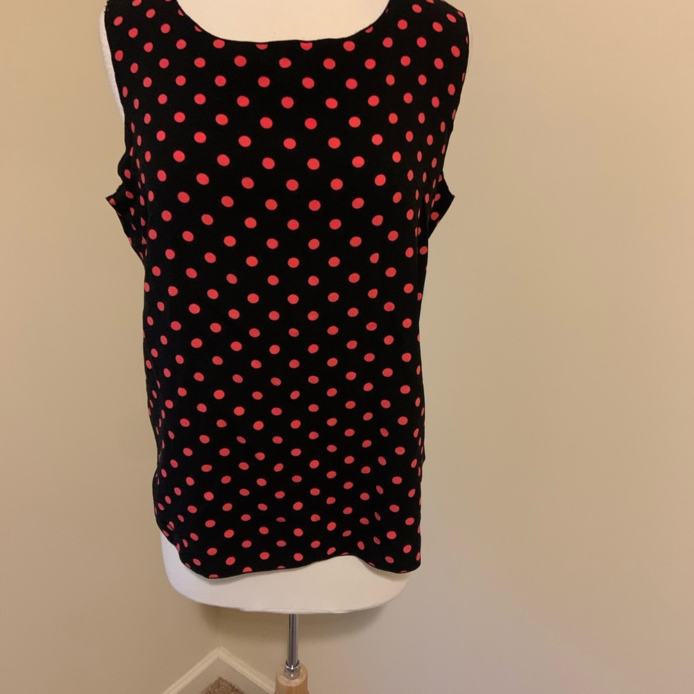 New black polka dot blouse w/button back closure.